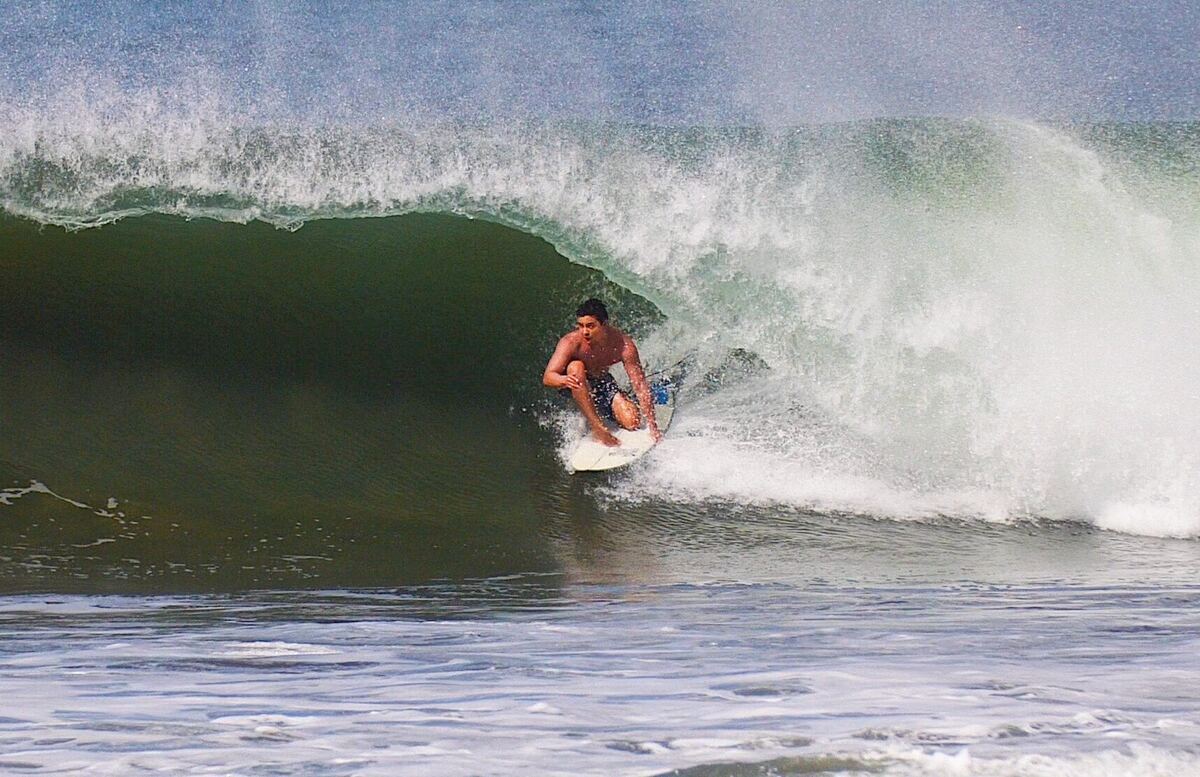 Jon Gryn surfing inside the barrel of a wave